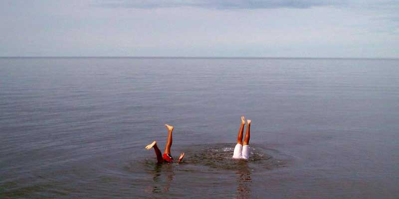 two children swimming in Lake Superior